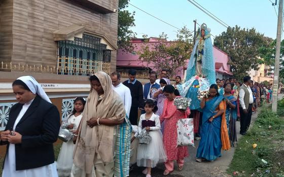 Salesian Sr. Rose Mary leads a Marian procession in connection with a Marian festival in a village near the Holy Rosary Basilica parish at Bandel, West Bengal state. (Courtesy of Salesian Fr. John Chalil)