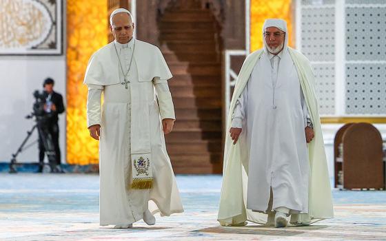 Pope Leo XIV and Rector of the Great Mosque of Algiers Mohamed Mamoun Al Qasimi during a visit to the Great Mosque of Algiers (Djamaa El Djazair), in Mohamadia, Algiers, Algeria, April 13, 2026. (OSV News/Reuters/Guglielmo Mangiapane)