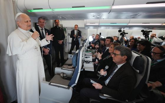 Pope Leo XIV speaks to journalists aboard a flight returning to Rome April 23, 2026, at the conclusion of his 11-day apostolic journey to Africa. (OSV News/Andrew Medichini, pool via Reuters)