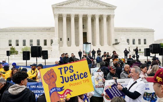 Immigrants' rights activists and demonstrators attend a rally outside the U.S. Supreme Court in Washington April 29, 2026, as justices hear arguments on whether the administration of U.S. President Donald Trump can end the temporary protected status of Syrian and Haitian nationals. (OSV News/Reuters/Nathan Howard)