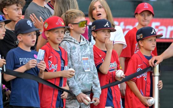 Young fans watch during batting practice before the game between the Los Angeles Angels and the Atlanta Braves at Angel Stadium in Anaheim, Calif., April 6. (OSV News/Jayne Kamin-Oncea-Imagn Images via Reuters)