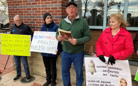 Former SNAP members protest outside the fall 2023 plenary assembly of the U.S. Conference of Catholic Bishops in Baltimore. From left to right are Frank Schindler, Judy Lorenz, David Lorenz and Teresa Lancaster. (Courtesy of David Lorenz)