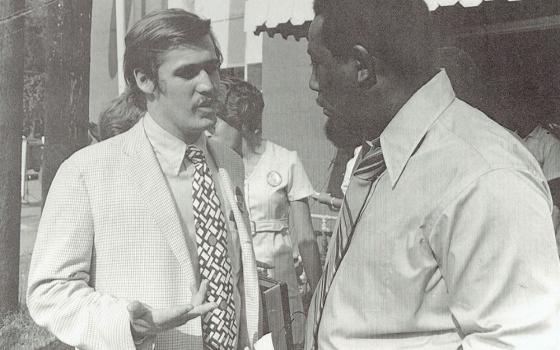 Longtime NCR contributor Jason Berry is pictured with Mississippi politician Charles Evers in 1971. "Conversations with Jason Berry," published by University Press of Mississippi as part of their Literary Conversations series, compiles 23 interviews in which Berry reflects on the forces that have shaped his work. (Courtesy of Jason Berry)