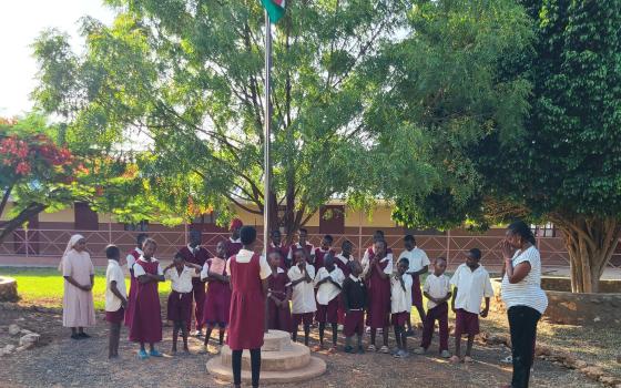 Children of the Divine Providence Home in Isiolo, Kenya, attend an assembly meeting with their teachers. Nirmala Dasi Sisters run the center, which focuses on children with mental disabilities who may also have physical disabilities. (Mourine Achieng)