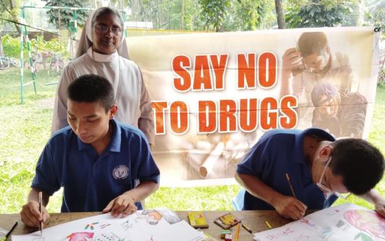 Hospitaller Sr. Merin Lukose, the director of Orsini Care Home at Bongaigaon town in Assam in northeastern India, conducts an art competition in connection with the International Day against Drug Abuse, held annually on June 26. (Courtesy of Merin Lukose)
