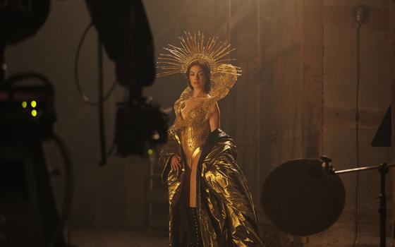In A24's psychological thriller "Mother Mary," Anne Hathaway plays a fictional pop star with religious imagery. (A24)