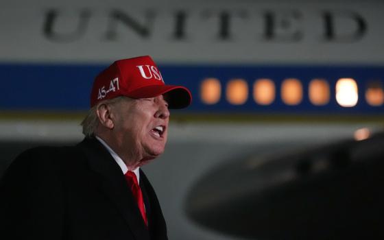 President Trump speaks to reporters April 12.