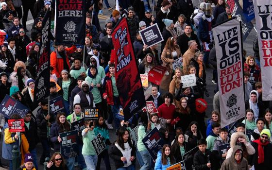 Anti-abortion demonstrators walk to the Supreme Court during the annual March for Life, Jan. 23, 2026, in Washington. 