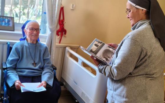 Home Notre Dame des Douleurs resident Sr. Rose Veplad, a member of the Little Sisters of Jesus congregation originally from Germany who has spent 60 years in Israel, enjoys a visit with home assistant manager Sisters of Daughters of Our Lady of Sorrows Sr. Claire-Emmanuel Pontroué. (Judith Sudilovsky)