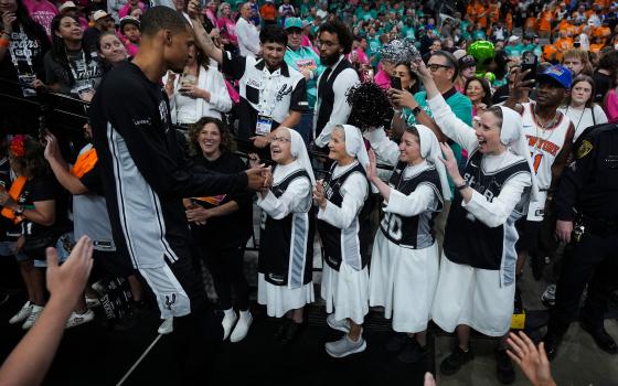 The Salesian Sisters greet players prior to Game 1 of the NBA Finals basketball series between the New York Knicks and the San Antonio Spurs