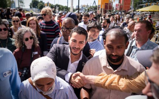 Abdul El-Sayed departs following a news conference at the Spirit of Detroit shortly after winning the Democratic nomination for U.S. Senate in Michigan Aug. 5, 2026, in Detroit. (AP/Julia Demaree Nikhinson)
