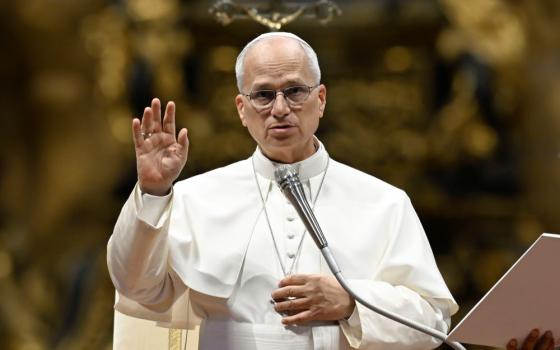 Pope Leo XIV offers his blessing to visitors and pilgrims during his weekly general audience in St. Peter's Basilica at the Vatican Aug. 26, 2026. (CNS/Vatican Media)