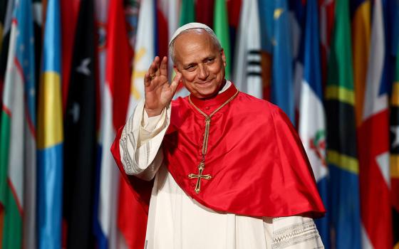 Pope Leo waves as he attends a meeting at the UNESCO headquarters in Paris Sept. 25, 2026, as part of his four-day apostolic journey to France. (OSV News/Reuters/Abdul Saboor)