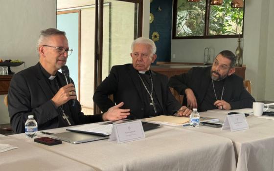 Bishop Pierre Goudreault, president of the Canadian Conference of Catholic Bishops, shares a few words while Bishop Ramón Castro Castro, president of the Mexican Bishops' Conference, and Bishop Daniel  Flores, vice president of the U.S. Conference of Catholic Bishops, look on during a trilateral meeting in Cuernavaca, Morelos state, Mexico. The group met Aug. 30-Sept. 4. (OSV News/Courtesy Mexican Bishops' Conference)