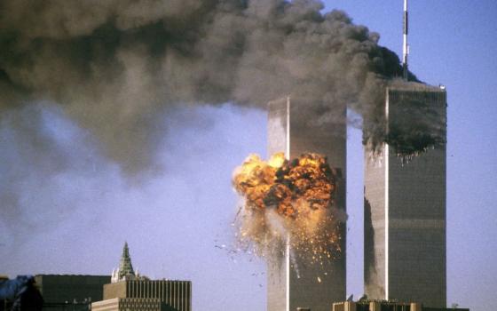 The south tower of the World Trade Center bursts into flames after being struck by United Airlines Flight 175 in New York in this Sept. 11, 2001, file photo. (OSV News/Reuters/Sean Adair)