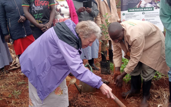 Presentation Sr. Joyce Meyer, international liaison to women religious for GSR and board member of the Conrad N. Hilton Foundation, plants a tree at a community farming project outside Mombasa, Kenya. (Hilton Foundation)