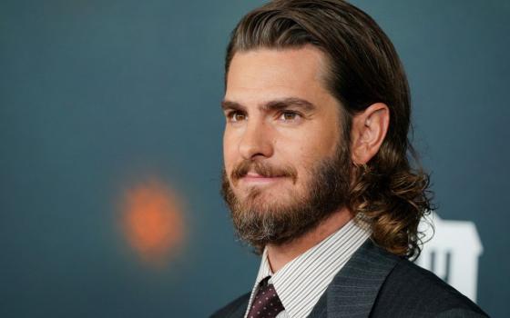 Andrew Garfield, shown arriving at the premiere of "The Uprising" on Sept. 2, 2026, has described feeling a "spiritual urgency" when choosing roles and has a reputation for gravitating toward characters with deep religious conviction. (AP/Invision/Jordan Strauss) 