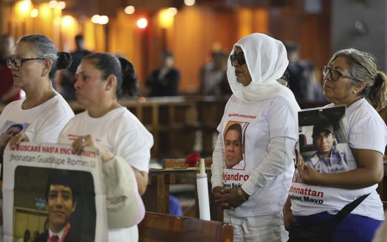 “Madres buscadoras” or searching mothers attend a Mass at the Basilica of Guadalupe in Mexico City, on Mother's Day, May 10, 2024. The searching mothers' volunteers look for the bodies of missing people, conducting their own hunts for clandestine graves where cartels hide their victims. (AP Photo/Ginnette Riquelme)