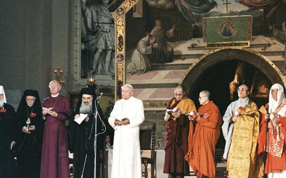 Pope John Paul II attends an interreligious peace meeting in Assisi, Italy, in this Oct. 27, 1986, file photo. (CNS/L'Osservatore Romano)