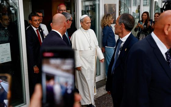 Pope Leo XIV leaves Rome's Gemelli Hospital Oct. 17, 2026, following his lung surgery and cancer diagnosis. (OSV News/Reuters/Vincenzo Livieri)