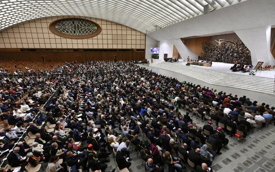 Pope Leo XIV, with regional representatives of synod teams, listens to and answers questions from participants in the Jubilee of Synodal Teams and Participatory Bodies in the Vatican audience hall Oct. 24, 2025. (CNS/Vatican Media)