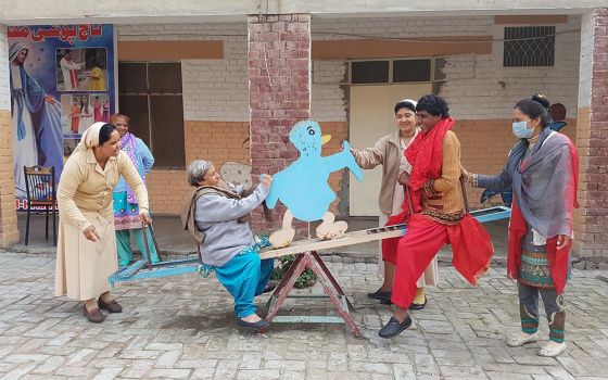 Sr. Mariam Gill (left) leads a sports session with female residents of Dar ul-Karishma (House of Wonders) in Youhanabad, a predominantly Christian district of Lahore, Pakistan. (Kamran Chaudhry)
