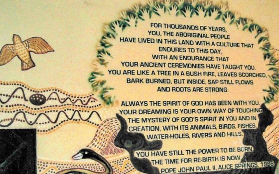 A highlight of my time in Redfern, Australia, was the communal painting of a mural in St. Vincent's Parish Church, with words from a speech made by Pope John Paul II at Alice Springs in 1986. (Courtesy of Esmey Herscovitch)