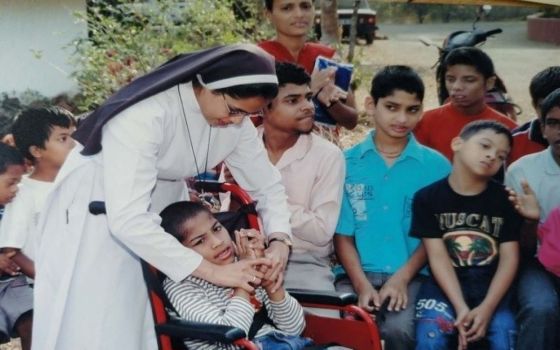 Sr. Monica Coelho of the Sisters of Holy Family of Nazareth of Sancoale Goa, India, with students at the Centre for the Differently Abled, a project of Caritas Goa. (Courtesy of Centre for the Differently Abled)