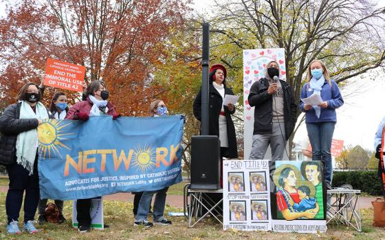 Catholic sisters listen to a father named Santiago speak Dec. 3 in Washington. Santiago, 37, spoke about his family's journey from Honduras to Mexico and, eventually for him and his youngest son, to the United States. (Courtesy of Network Lobby)