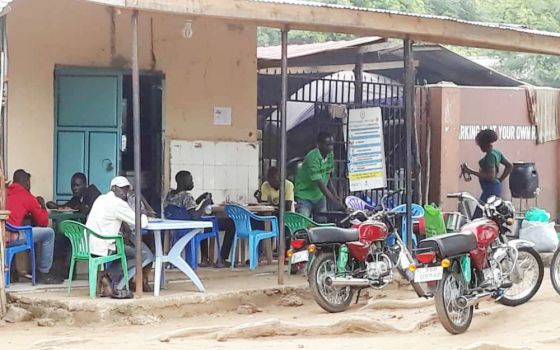 Some women earn a living by managing this food kiosk, which provides tea, maize and beans to passing businessmen on motorcycles in Juba, South Sudan. (Provided photo)