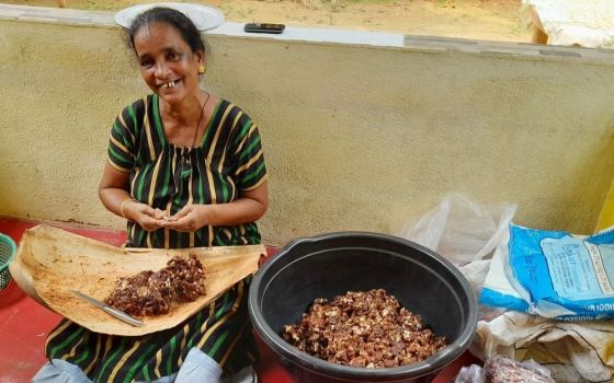 Lucy D'Souza prepares pickled tamarind to sell in the market in Mangaluru, southern India. (Courtesy of Clara D'Cunha)