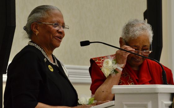 Sr. Addie Lorraine Walker speaks July 27 to members of the National Black Sisters' Conference, at the University of Notre Dame. Walker was elected president of the group at the meeting. At right is outgoing president Sr. Josita Colbert. (GSR)