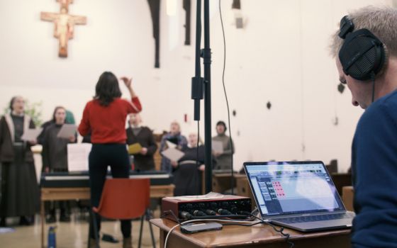 James Morgan, right, checks the recording levels as the sisters perform some of the music to which St. Clare's writing was set for the first time for the album "Light for the World." (Morgan Pochin Music Productions)