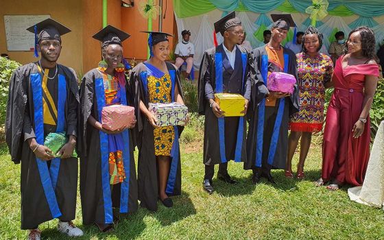 Tailoring students were awarded prizes by Jesuit Refugee Service on graduation day in Kampala, Uganda. (Courtesy of Jesuit Refugee Service)