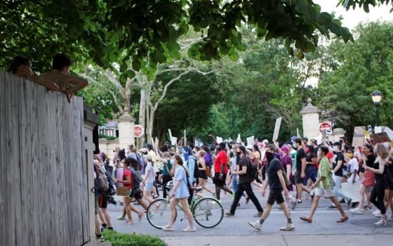 Black Lives Matter demonstrators in St. Louis march against police brutality June 12. (CNS Reuters/Lawrence Bryant)