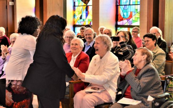 Civic and community leaders of Erie, Pennsylvania, and many friends and associates celebrate three social justice icons, Mercy Sr. Rita Brocke, St. Joseph Sr. Mary Claire Kennedy and Benedictine Sr. Marlene Bertke, at a 2019 Catholic Sisters Week event.