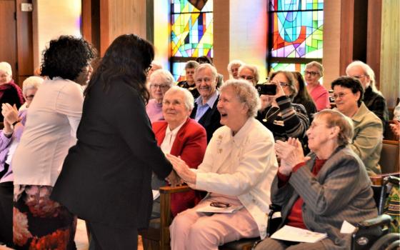 Civic and community leaders of Erie, Pennsylvania, and many friends and associates celebrate three social justice icons, Mercy Sr. Rita Brocke, St. Joseph Sr. Mary Claire Kennedy and Benedictine Sr. Marlene Bertke, at a 2019 Catholic Sisters Week event.