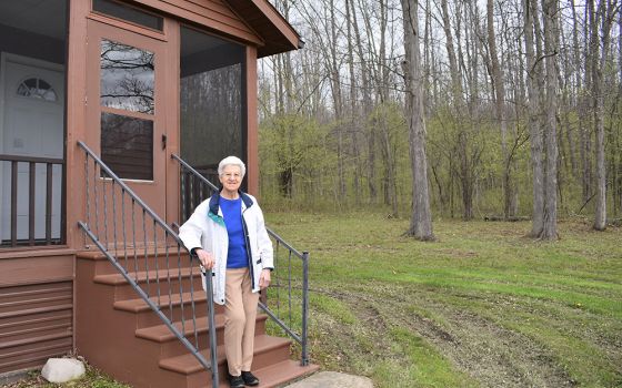 Mercy Sr. Donna Marie Paolini on the hermitage steps at the Center for Solitude in Belmont, New York (Courtesy of the Sisters of Mercy)