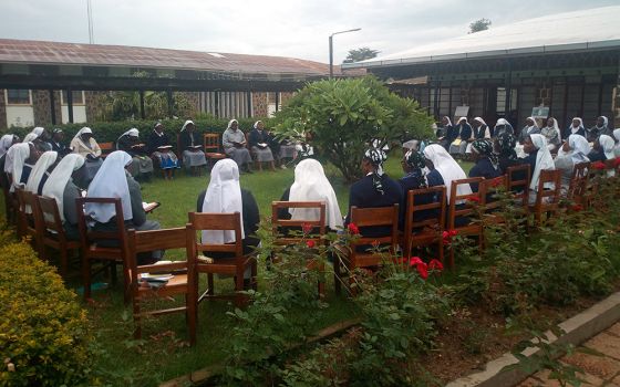 Members of the Tertiary Sisters of St. Francis in Shisong, Cameroon, meet during a previous Earth Day commemoration. The congregation's many environmental projects include community gardens that serve as a demonstration site to boost soil fertility. The g