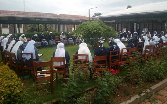 Members of the Tertiary Sisters of St. Francis in Shisong, Cameroon, meet during a previous Earth Day commemoration. The congregation's many environmental projects include community gardens that serve as a demonstration site to boost soil fertility. The g