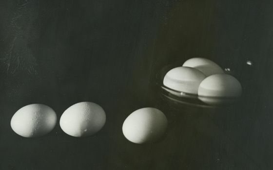 Six eggs and a glass bowl, resting on top of a piece of the religious habit that the author once wore. (Provided photo)