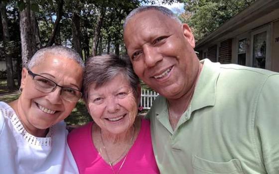 Dominican Sr. Liz Engel, center, met Liddy Olano, left, at St. Dominic's Home, an orphanage in Blauvelt, New York, Engel's former ministry. Olano met her husband, Joseph, right, at an event for the home's alumni. (Courtesy of Liz Engel)