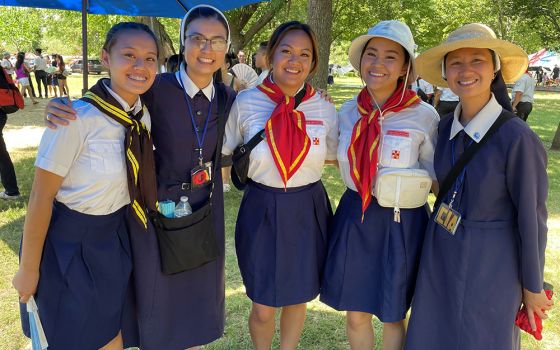 Sr. Kimberly Nguyen, second from left, poses with Sr. Oanh Nguyen, far right, and three biological sisters — Monica Do, Lorraine Do, and Catherine Do — at the Aug. 4-7 Marian Days celebration in Carthage, Missouri. (Peter Tran)