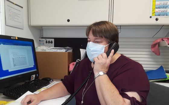 Sr. Michelle Woodruff of the Adorers of the Blood of Christ calls contacts of people who have tested positive for COVID-19 in April. She is a public health nurse at Crownpoint Health Care Facility in New Mexico. (Provided photo)