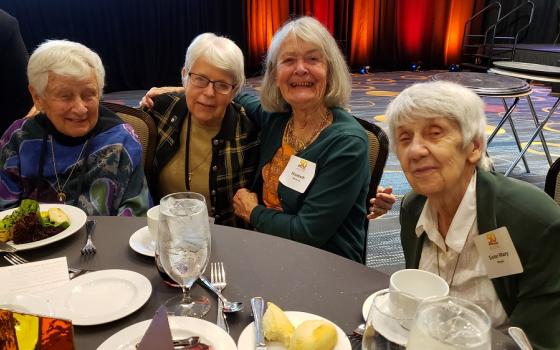 From left: Dominican Sr. Carol Coston, Network's founding executive director; Ursuline Sr. Angela Fitzpatrick; Elizabeth Morancy, a former Sister of Mercy; and Sr. Mary Hayes of the Sisters of Notre Dame de Namur