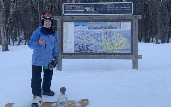 This is me on top of the mountain, about to snowboard on an intermediate slope. I didn't do any black diamonds, but I feel confident that I can try to do one next time. (Provided photo)