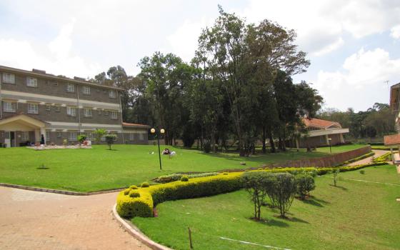 Manicured lawns and paved walkways accentuate buildings at the St. Joseph Spiritual Center in Karen, a suburb southwest of the Nairobi central business district. The Little Daughters of St. Joseph manage the center. (Wycliff Oundo)