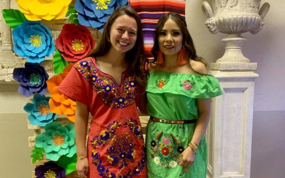 Mari, right, and me in our Mexican dresses at her brother's despedida de solteros. (Provided photo)