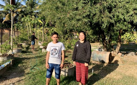 Students Phonexay Phomvihan, left, and Vanhny Sinsomboun, right, say they are grateful for the opportunity to live at the Nazareth Center and pursue vocational training in Vientiane, Laos. (Akarath Soukhaphon)