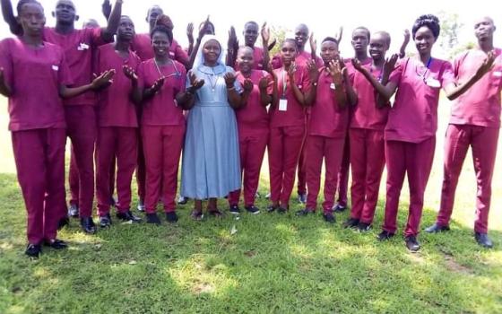 Sr. Regina Roba, in blue, with Catholic Health Training Institute students (Courtesy of Friends in Solidarity)